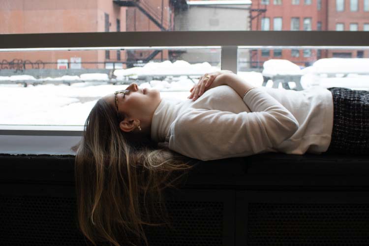 Adrian Louíse Calcagnotto lying completely flat to control her anxiety