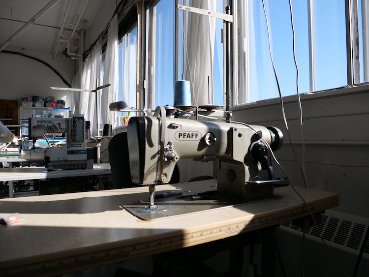 A vintage sewing machine in a studio.