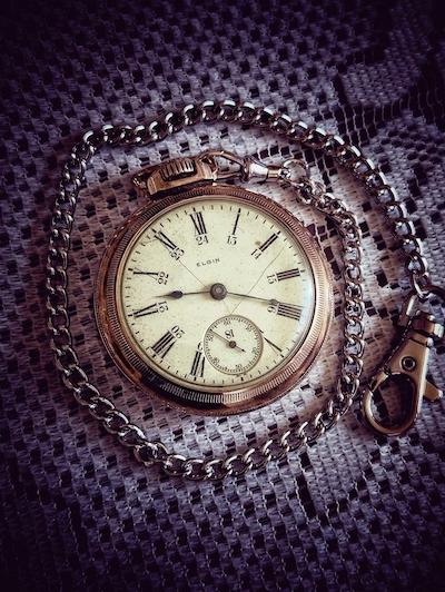 A vintage Elgin pocket watch from the 1920s.